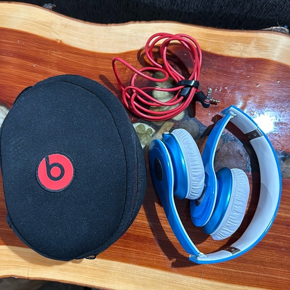 Beats by Dre Other - Beats by Dr. Dre blue and white. One ear is very faint but other is perfect